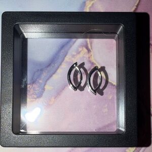 Titanium never worn belly rings